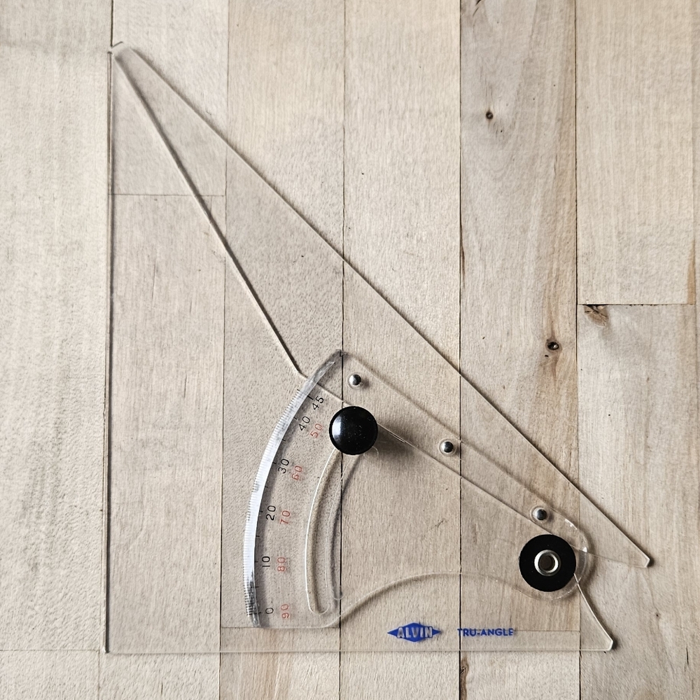 This is an Alvin Tru-Angle adjustable drafting triangle. 